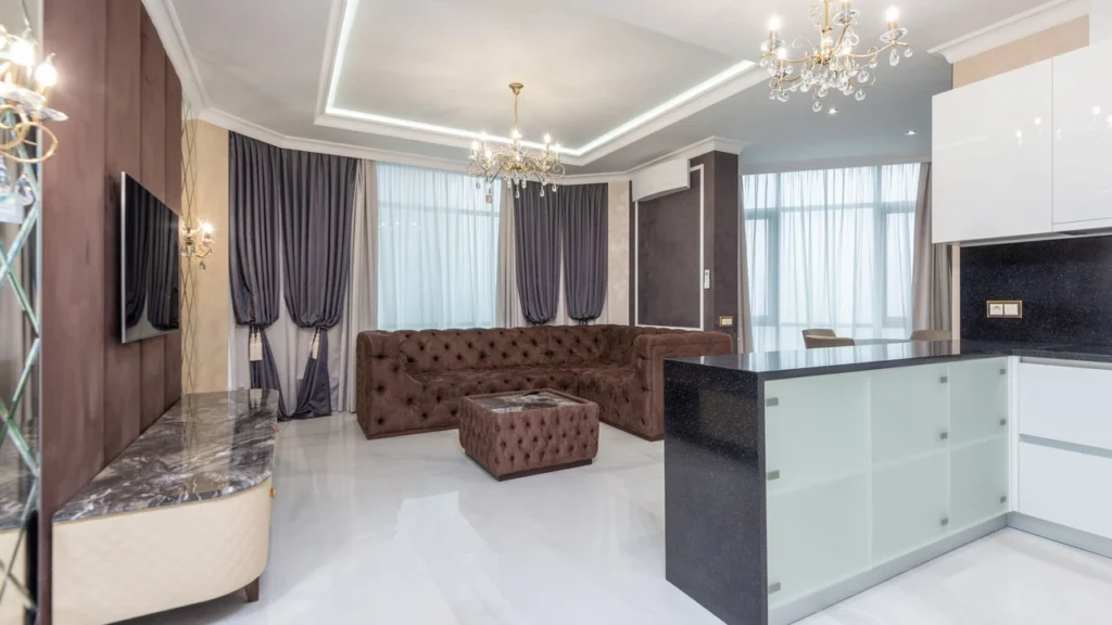 Professional deep cleaning team showing a pristine clean luxury living room after service completion