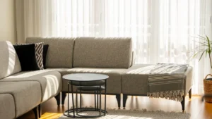 Professional team deep cleaning a large sectional sofa in living room